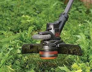 Close up view of the BLACK+DECKER STC1820PC-GB Cordless Grass Trimmer.
