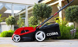 Side view of the Cobra MX3440V Lawn Mower.