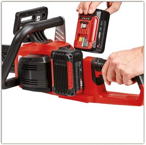 Inserting a battery into the Einhell GE-LC 36/35 Li-Solo Cordless Chainsaw.