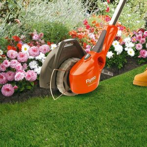 Cutting edges with the Flymo Contour Cordless 20V Li Grass Trimmer.