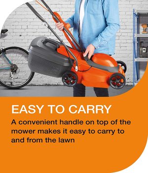 Carrying the Flymo EasiMow 340R Electric Rotary Lawn Mower.