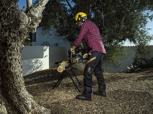 McCulloch CS42S Petrol Chainsaw in use.