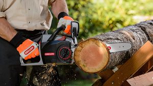 OREGON CS300 Chainsaw in use.