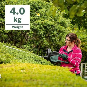 Bosch AdvancedHedgeCut 70 Hedge Trimmer in use.