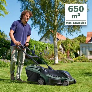 Bosch AdvancedRotak 650 Electric Lawnmower in use.