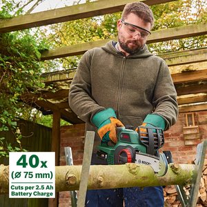 Bosch UniversalChain 18 Cordless Chainsaw in use.