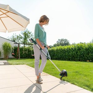 Cutting edges with the Bosch UniversalGrassCut 18 Cordless Grass Trimmer.