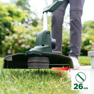 Bosch UniversalGrassCut 18 Cordless Grass Trimmer in use.