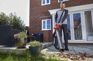 Flymo PowerVac 3000V Electric Blower in use.