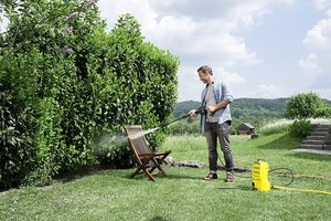 Karcher K2 Compact Pressure Washer in use.