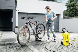 Karcher K2 Premium Full Control Pressure Washer in use.