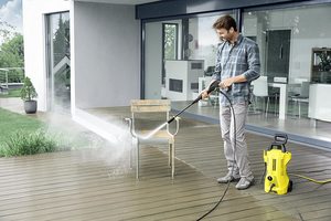 Karcher K2 Premium Full Control Pressure Washer in use.