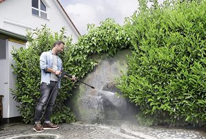 Karcher K4 Compact Pressure Washer in use.