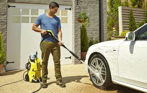 Karcher K4 Full Control Pressure Washer in use.
