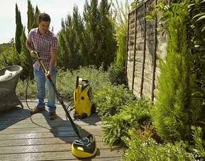 Karcher K4 Premium Full Control Pressure Washer in use.