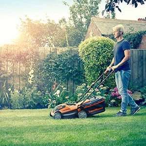 LawnMaster Cordless Lawnmower in use.