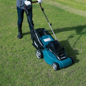 Makita DLM380Z Lawn Mower in use.