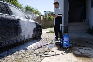 Nilfisk Core 125 Pressure Washer in use.