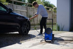 Nilfisk Core 130 Pressure Washer in use.