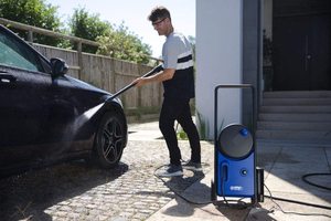Nilfisk Core 140 In-Hand Power Control Pressure Washer in use.
