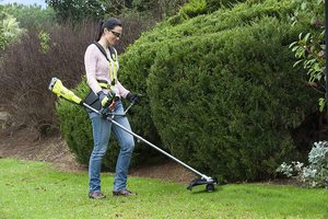 Ryobi OBC1820B 18V One+ Brush Cutter in use.