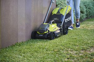 Cutting edges with the Ryobi OLM1833B Lawn Mower.