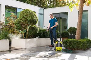 Ryobi RPW120B Pressure Washer in use.