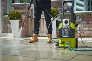 Ryobi RPW120B Pressure Washer in use.