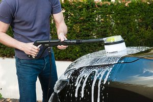 Ryobi RPW150XRB Pressure Washer in use.