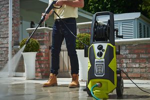 Ryobi RPW150XRB Pressure Washer in use.