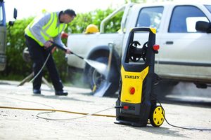 STANLEY SXPW16PE Pressure Washer in use.