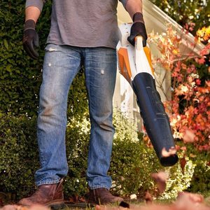 Stihl BGA 57 Cordless Leaf Blower in use.